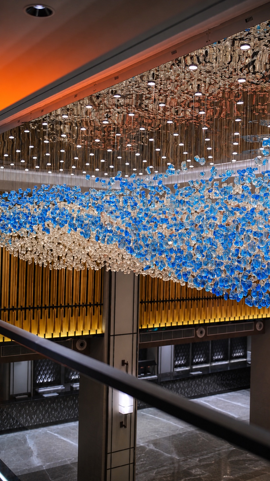 Blue and crystal ceiling installation inside Aroha Hall